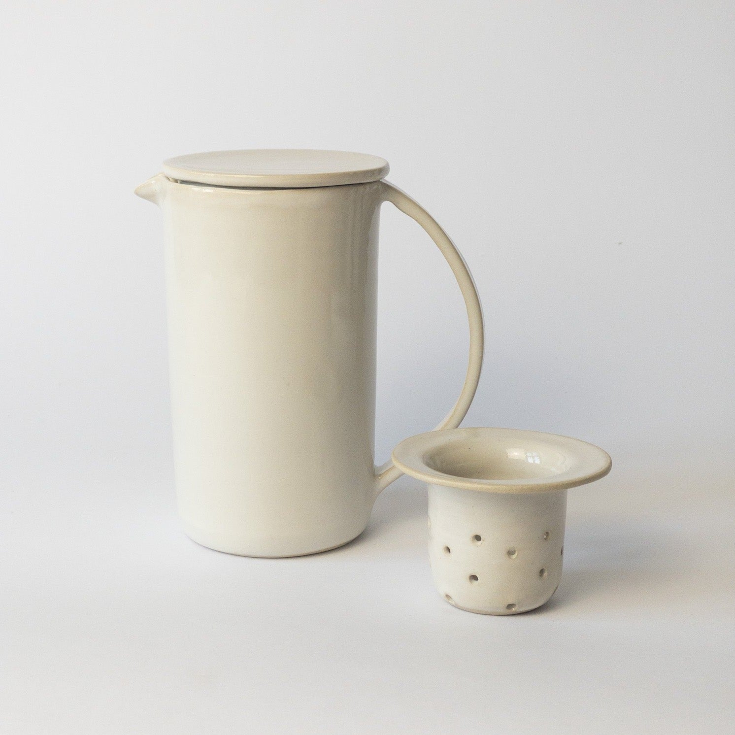 Handmade teapot with strainer